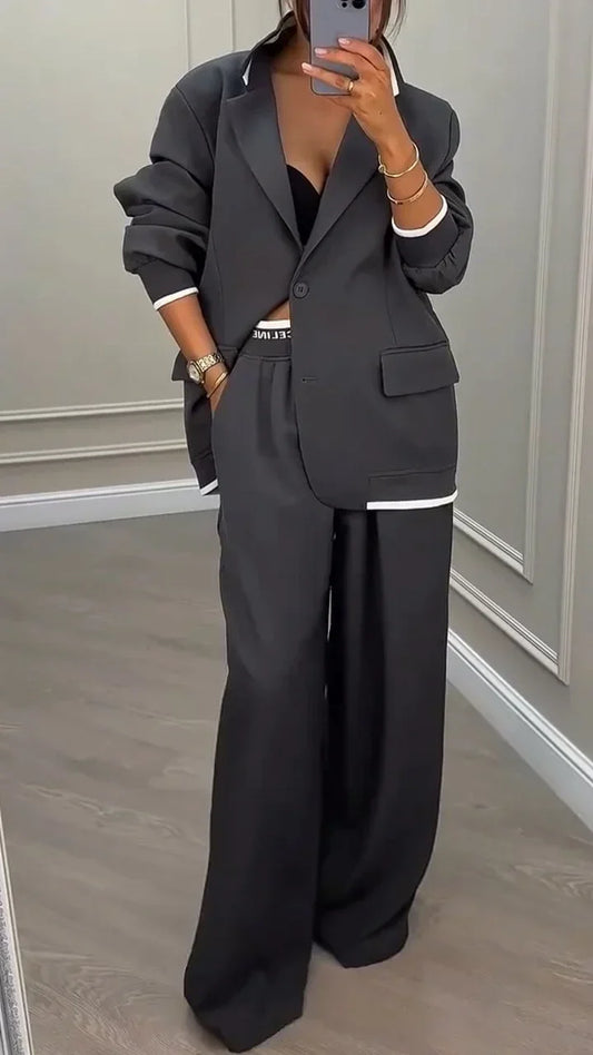 Costum oversized pentru femei, cu blazer la un rând de nasturi și pantaloni largi, croiți – Set elegant pentru serviciu, birou și ținute smart casual