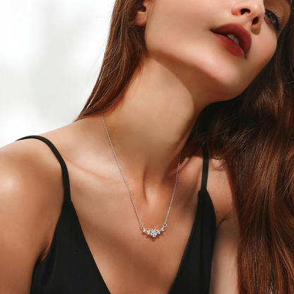 Women's flower necklace with cubic zirconia, a silver-colored chain, and a sparkling crystal pendant – delicate jewelry for everyday wear, parties, and special occasions