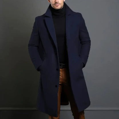 Pánský dlouhý elegantní kabát na míru s jednořadým zapínáním a klopami s vroubkovaným okrajem – elegantní svrchní oděv na podzim, zimu, do kanceláře i pro každodenní nošení