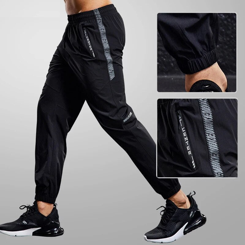 Pánské jogger kalhoty s kapsami na zip a rychleschnoucí látkou – lehké kalhoty se zúženým střihem na trénink, běh a každodenní nošení