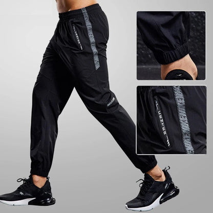 Pánské jogger kalhoty s kapsami na zip a rychleschnoucí látkou – lehké kalhoty se zúženým střihem na trénink, běh a každodenní nošení