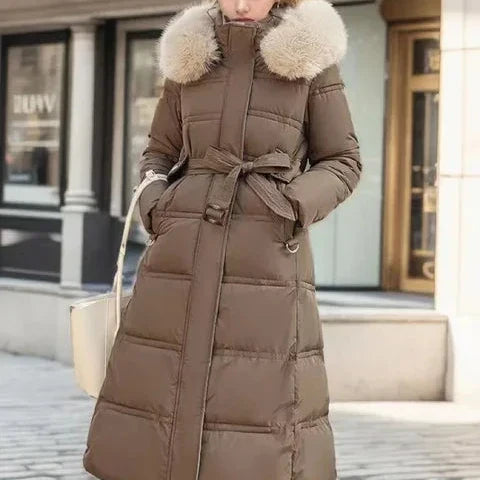 Abrigo puffer largo acolchado para mujer, con capucha y pelo sintético - Prenda de abrigo de invierno cálida, con cinturón y cintura entallada, para días fríos, uso diario y actividades al aire libre