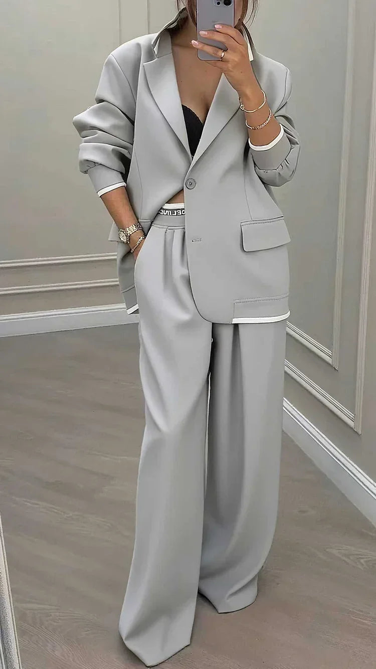 Dámský oversized kostým s jednořadým sakem a širokými kalhotami na míru – elegantní souprava do práce, kanceláře a pro styl smart casual