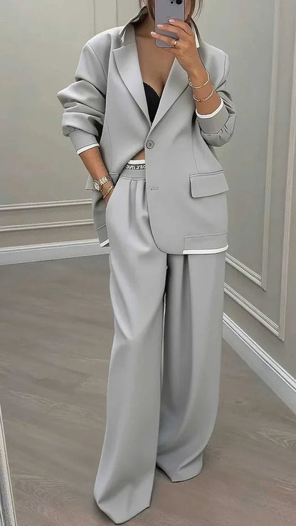 Dámský oversized kostým s jednořadým sakem a širokými kalhotami na míru – elegantní souprava do práce, kanceláře a pro styl smart casual