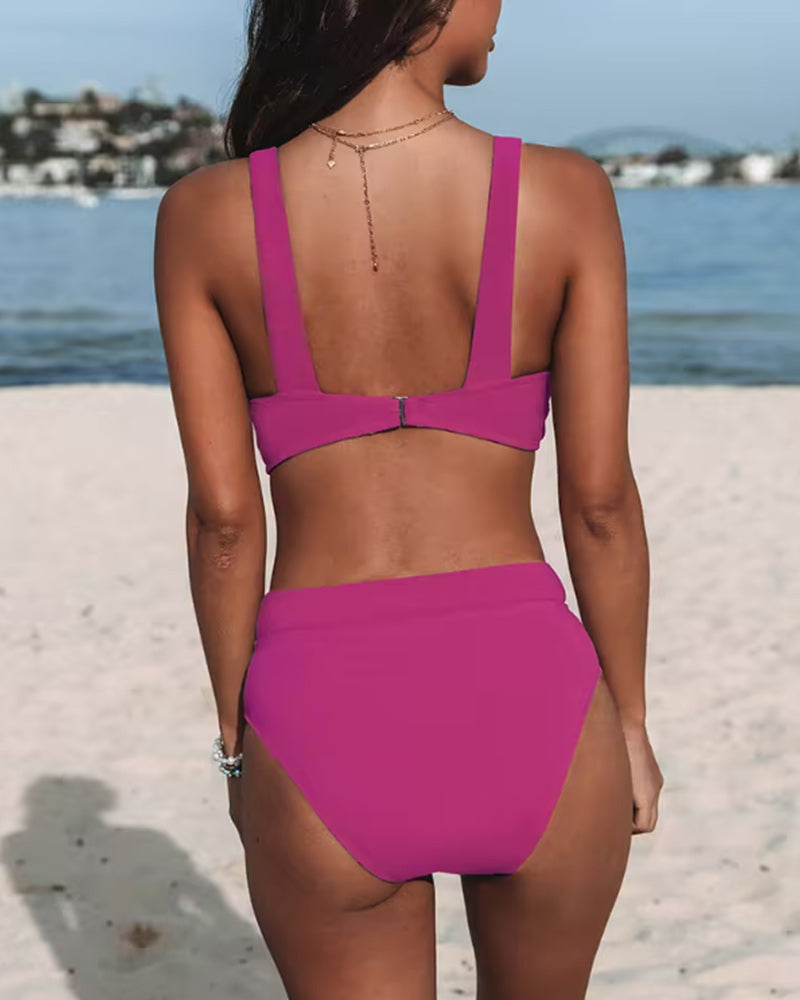 Women’s bikini set with a deep V-neckline and high-waisted bottoms – stylish swimwear for the beach, pool, and summer vacation