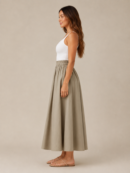 Falda midi de línea A para mujer, de cintura alta, con cintura elástica, pliegues suaves y bolsillos - falda elegante y cómoda para el trabajo, el uso diario y el tiempo libre