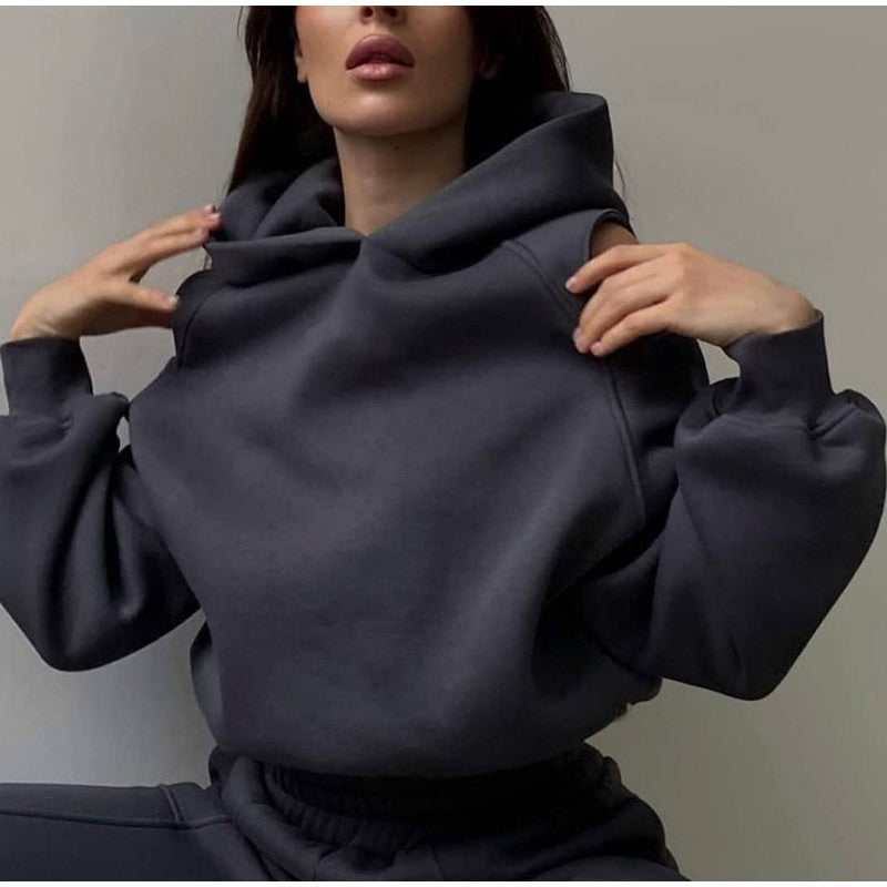 Dámská oversized mikina s kapucí a spadlými rameny – volný a pohodlný pulovr pro každodenní nošení, odpočinek a ležérní styl