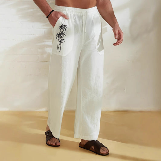 Men's relaxed linen trousers with wide legs, a drawstring waist, practical pockets, and palm tree detail - airy summer trousers for vacations, beach trips, and everyday wear