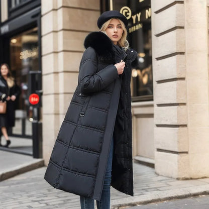 Abrigo puffer largo y acolchado para mujer con capucha y piel sintética - Prenda de abrigo cálida con cinturón y cintura marcada para los fríos días de invierno, el uso diario y las actividades al aire libre