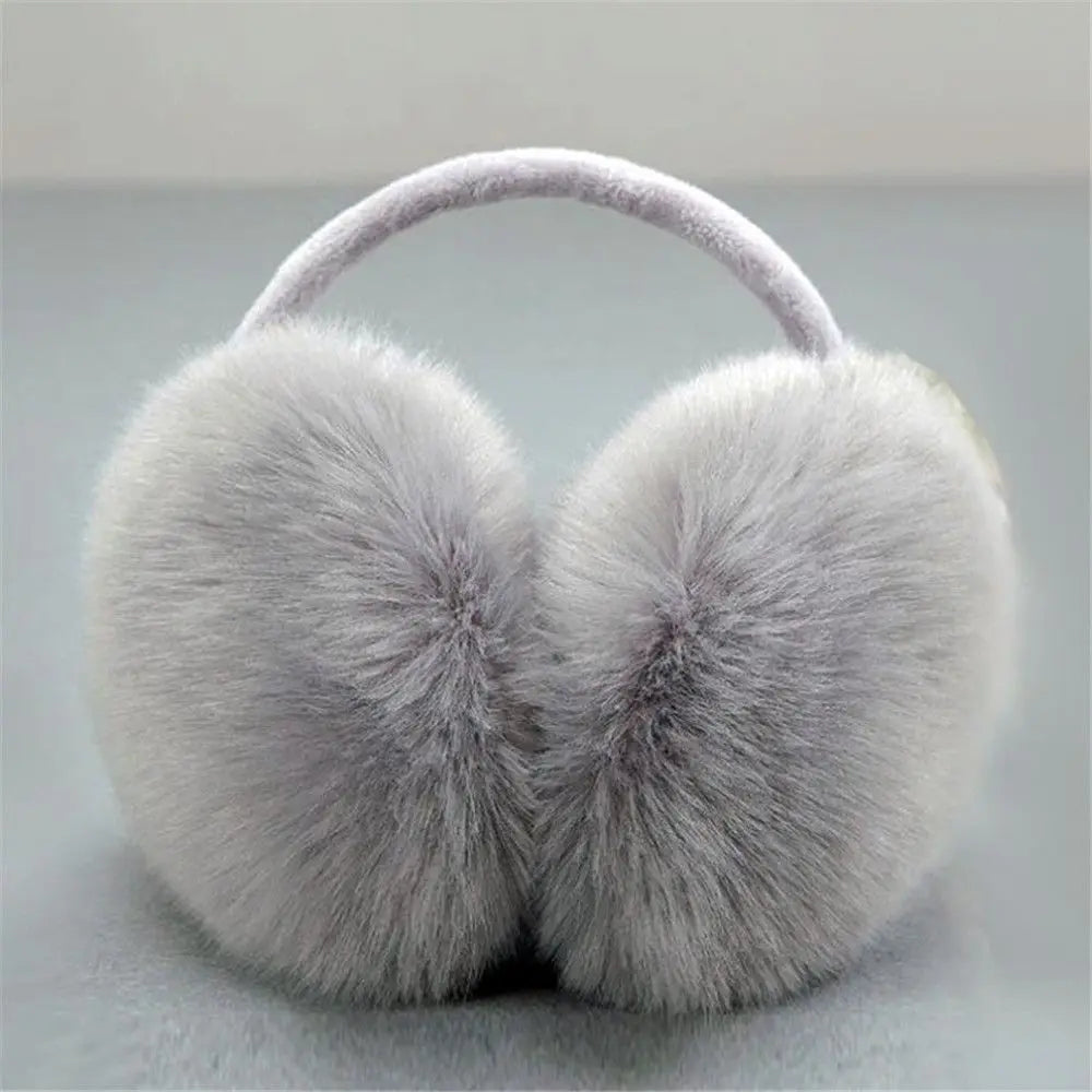 Women's padded plush earmuffs with soft thermal headband - warm winter earmuffs for travel, cold days, and outdoor use