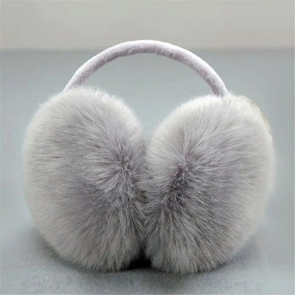 Women's padded plush earmuffs with soft thermal headband - warm winter earmuffs for travel, cold days, and outdoor use