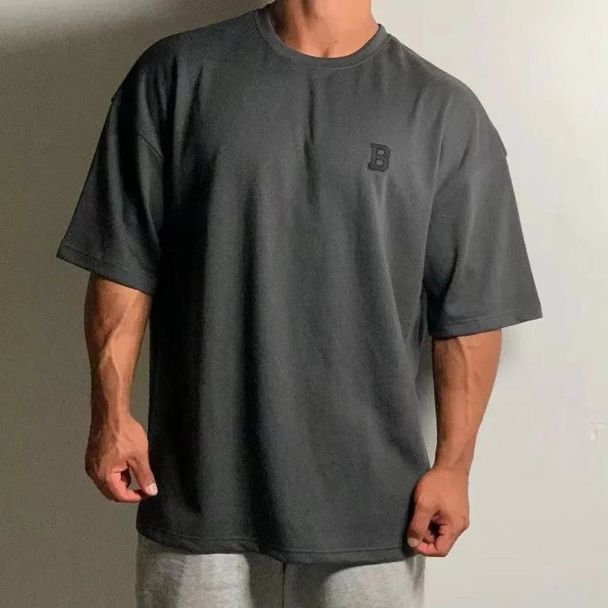 Camiseta de fitness oversize para hombre con cuello redondo y hombros caídos - camiseta informal de entrenamiento para fitness, entrenamiento, running y tiempo libre