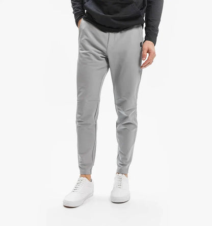 Pantalones de corte slim para hombre con elasticidad - Pantalones informales con perneras cónicas y bolsillos laterales para un uso diario cómodo y un estilo informal
