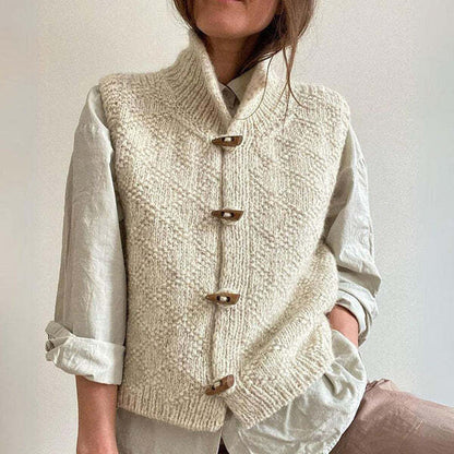 Women's knitted vest with textured finish, high neck, toggle button closure, and sleeveless design - a top for work, fall, winter, and everyday wear
