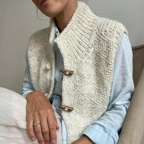 Women's knitted vest with textured finish, high neck, toggle button closure, and sleeveless design - a top for work, fall, winter, and everyday wear