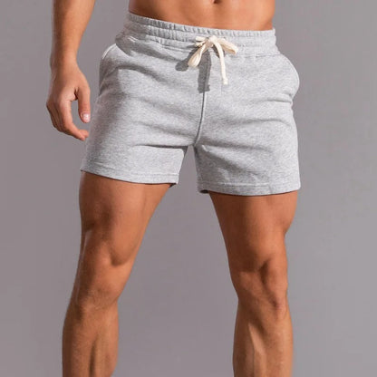 Pantalones cortos deportivos para hombre con cordón y cintura elástica - pantalones cortos de entrenamiento con bolsillos laterales para fitness, running, deporte y tiempo libre
