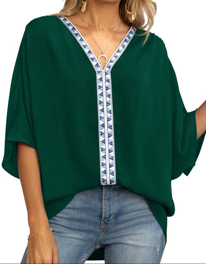Women's oversized V-neck tunic with batwing sleeves - relaxed summer top with geometric trim for leisure and everyday wear