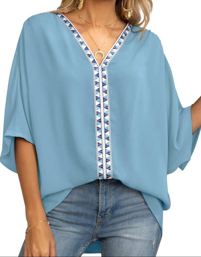 Women's oversized V-neck tunic with batwing sleeves - relaxed summer top with geometric trim for leisure and everyday wear