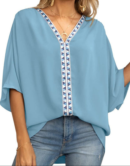 Women's oversized V-neck tunic with batwing sleeves - relaxed summer top with geometric trim for leisure and everyday wear