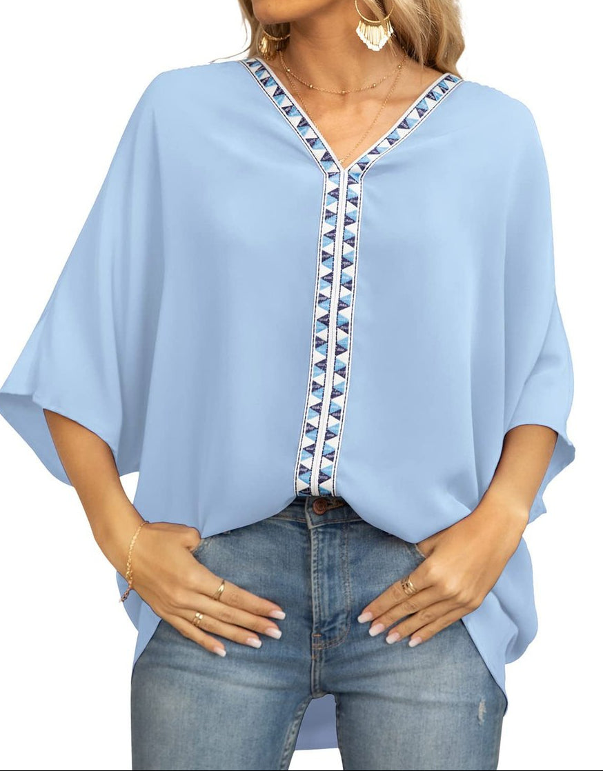 Women's oversized V-neck tunic with batwing sleeves - relaxed summer top with geometric trim for leisure and everyday wear